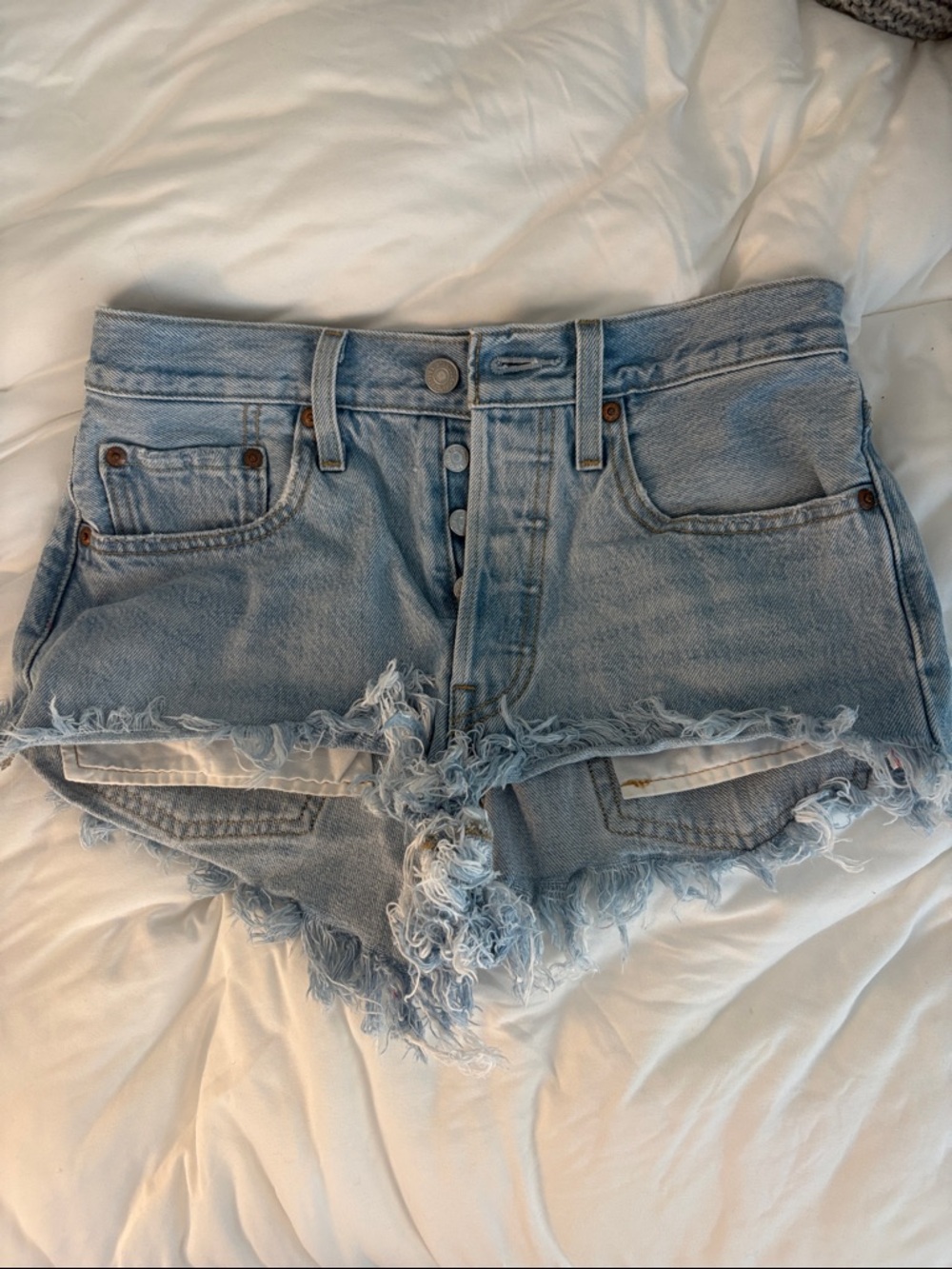 Levi's Light Blue Frayed Denim Cutoff Shorts